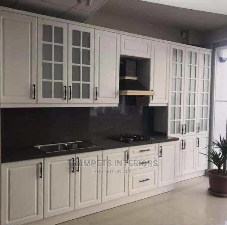 White Kitchen Cabinets/ Moulded Shutters Call
