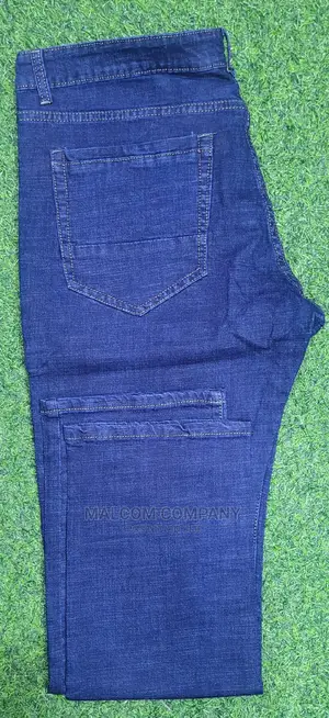 Photo - Men Plain Blue Jeans.