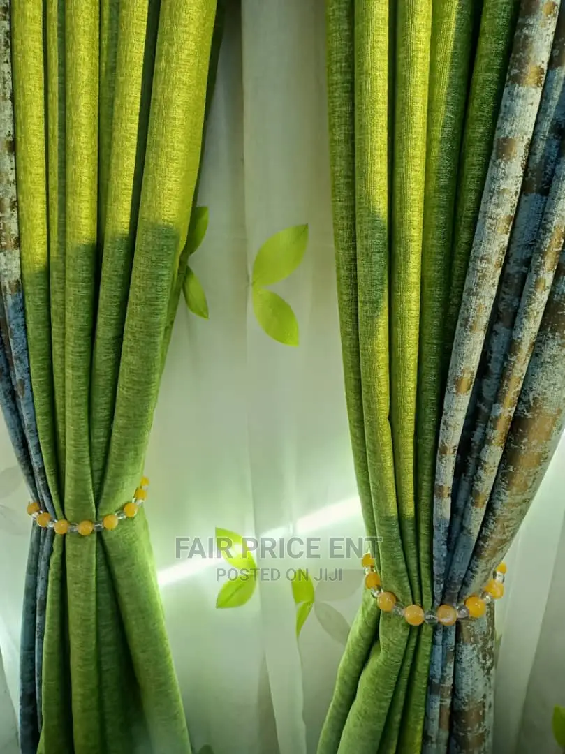 Curtains Materials.35000 Per Metre.( Green)