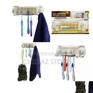 Wall Attached Brush Hanger.