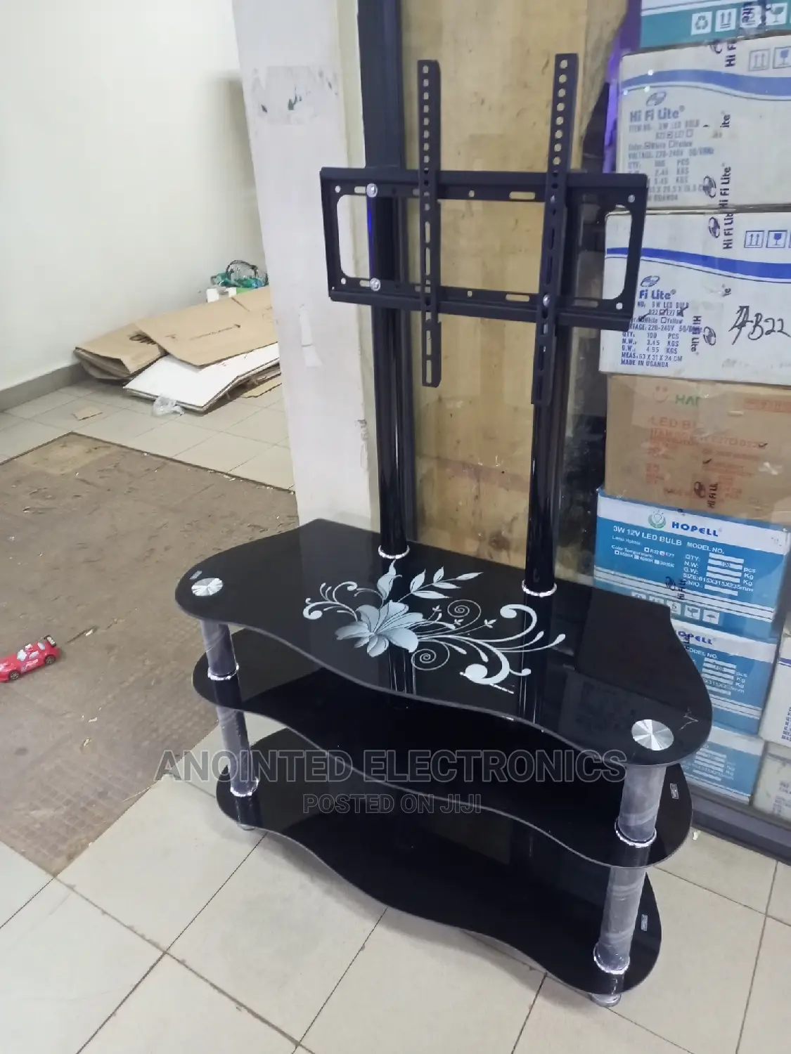 Tv Stand With a Bracket for Holding Tv