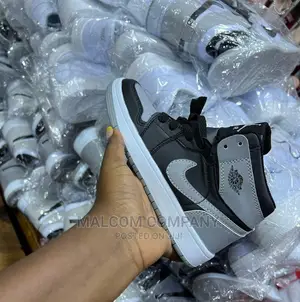 Photo - Nike Jordan 1 Kids Shoes