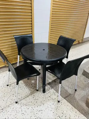 Four Chairs and Round Table