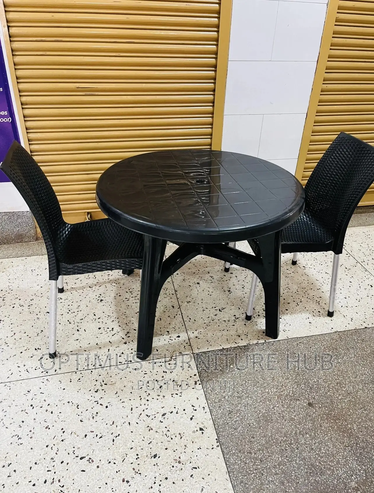 Table and Plastic Chairs