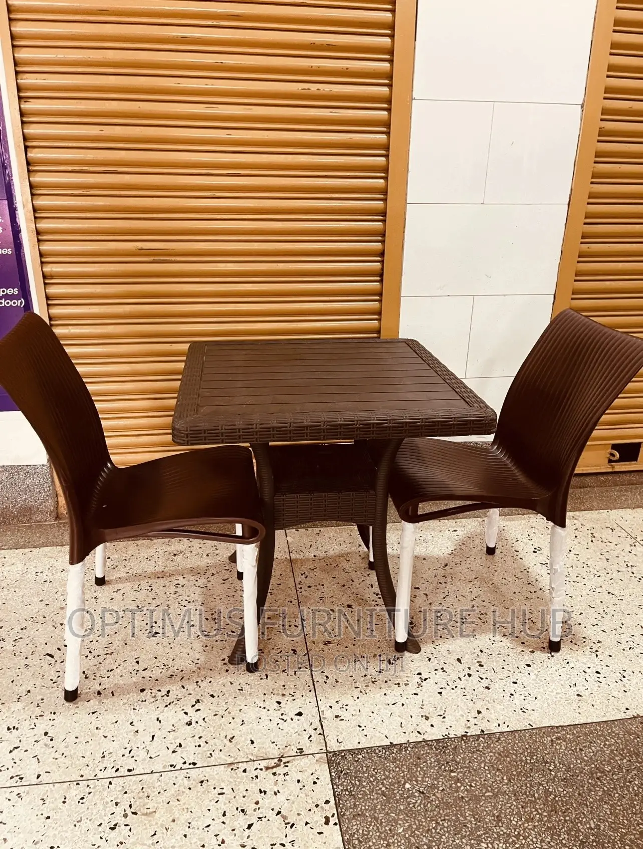 Two Brown Chairs and Table