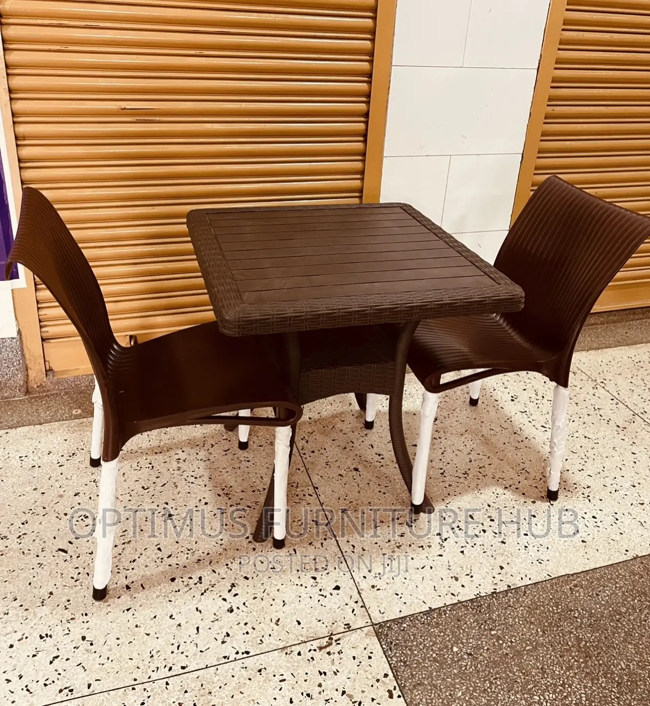 Table and Brown Armless Chair