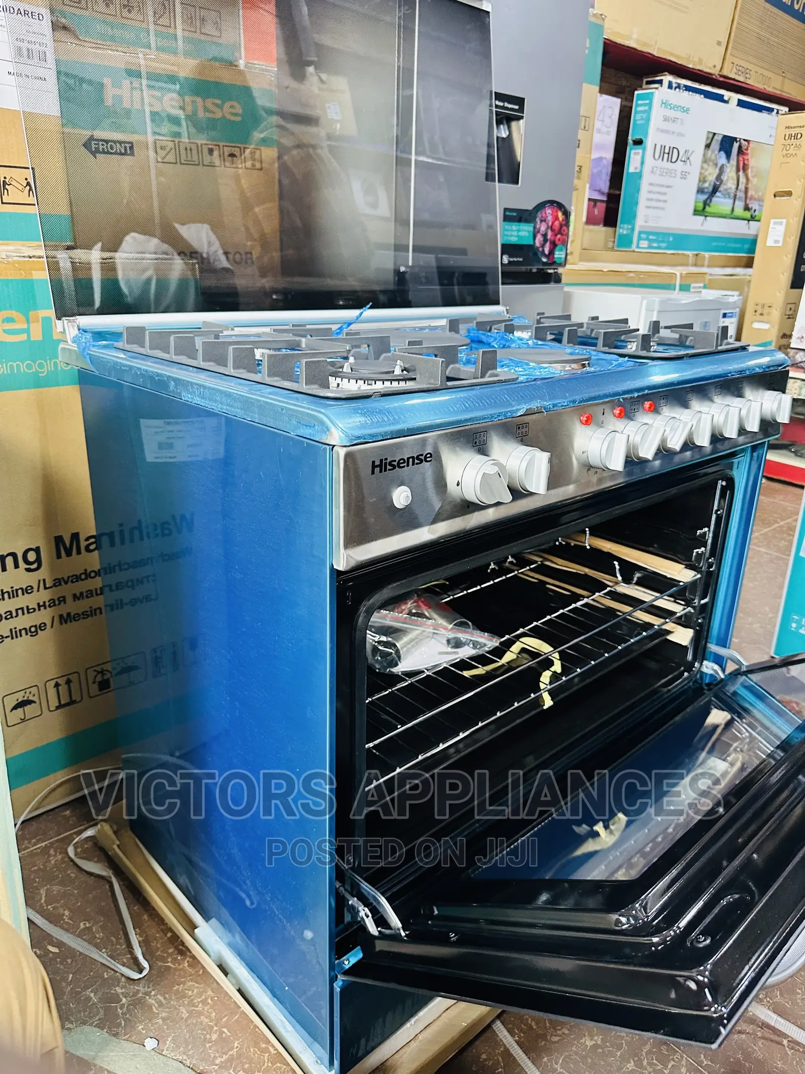 Hisense Cooker With 4gas Burners 2 Hot Plates 90 by 60 Cm