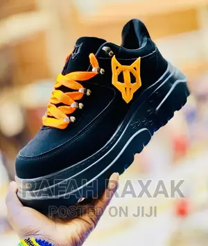 Photo - Classic Unisex Black Suede Naked Wolfe Sneaker