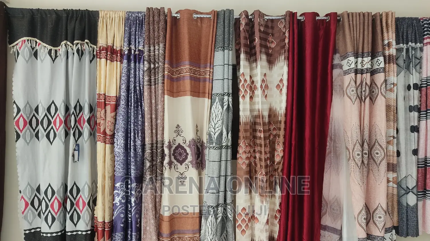 A Pair of Curtains With Buttons