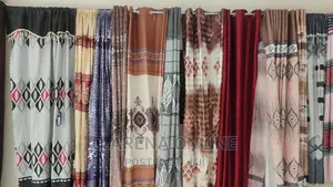 A Pair of Curtains With Buttons
