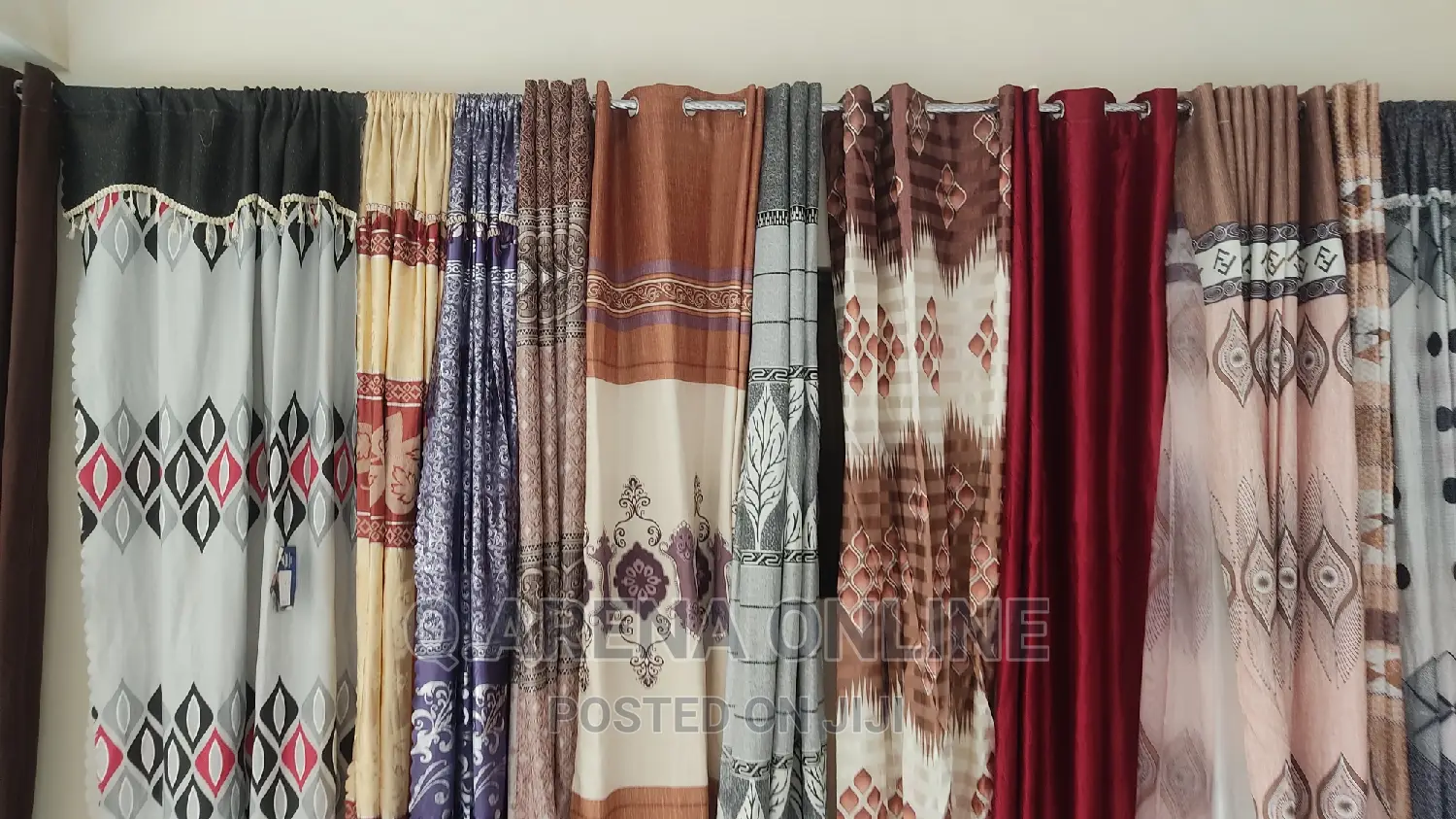 A Pair of Curtains With Buttons
