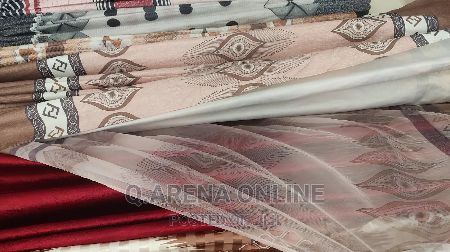 A Pair With Curtains With a Net