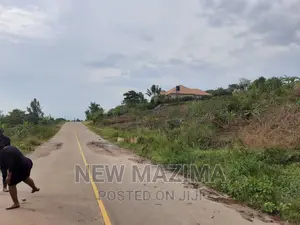 Veryhot 2acres Measurig Direct From Tarmac of Mpigi Mpabire