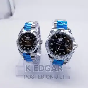 Photo - Pair of Silver Rolex Couple Watches