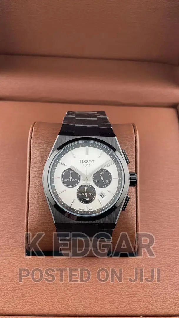 Silver Tissot Watch With Chronograph
