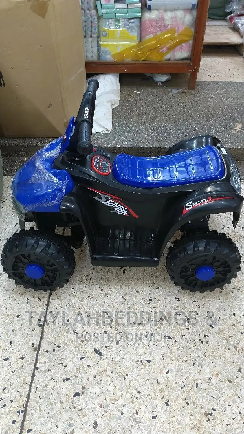 Blue and Black Kids Plastic 
4 Wheel Bike
