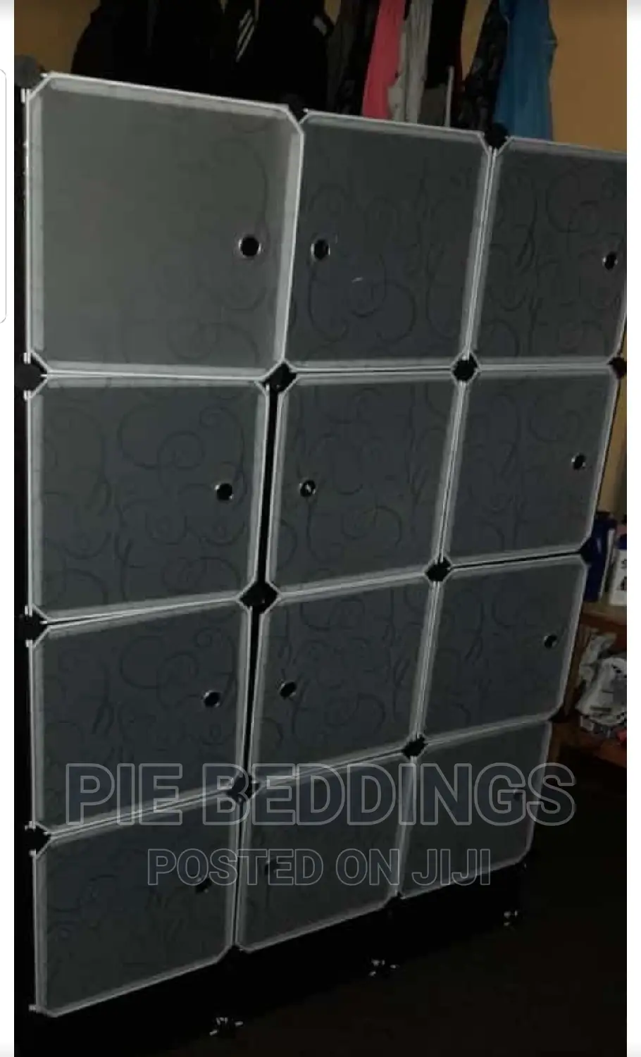 Black Plastic 3 Column Closet With a Shoe Rack