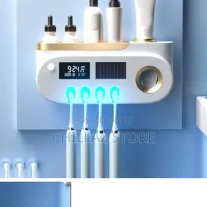 Wall Mounted Electric Toothbrush and Toothpaste Holder.