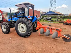 New Holland Tt75 4wd Tractor With Plough
