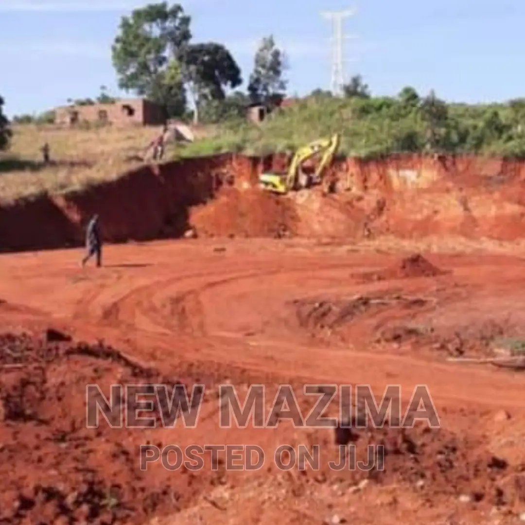 4.8 Acres Measuring Direct From Tarmac of Masaka Rd Titled