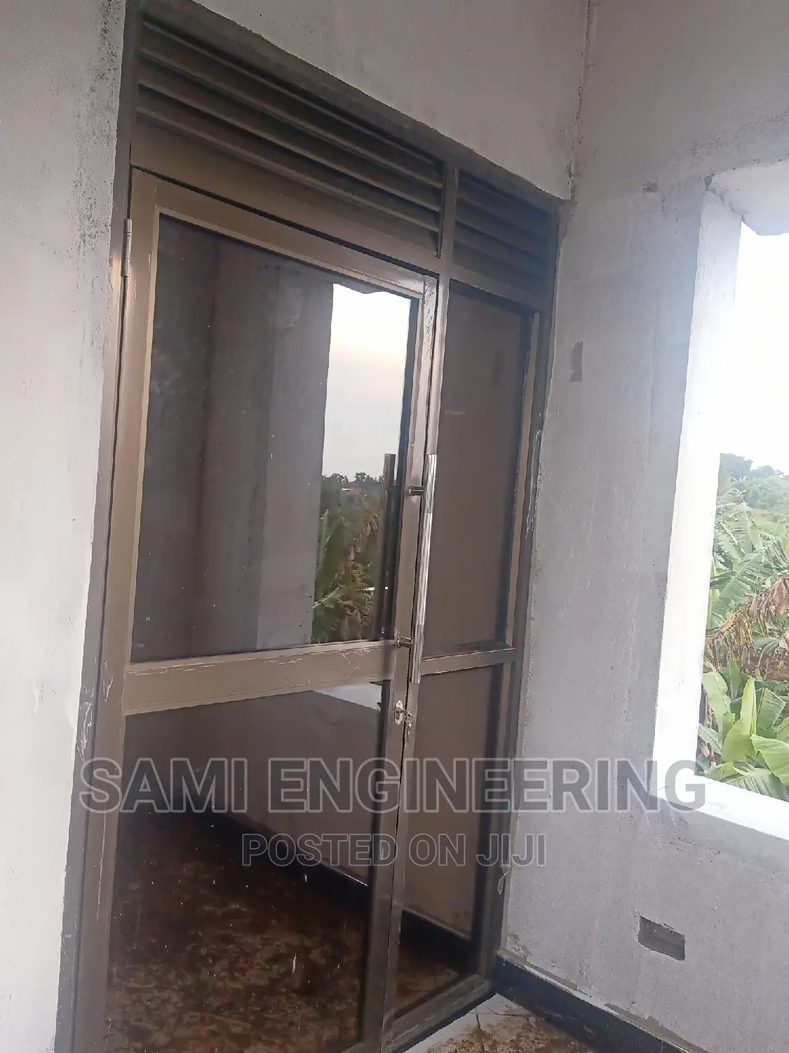 Aluminum Swinging Door Wakiso Nkoowe