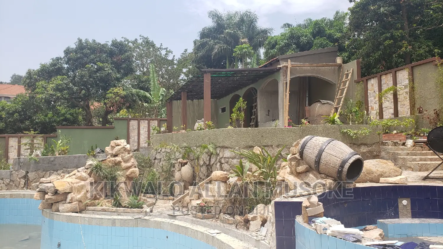 Waterfall, Fountain, Antique Bolders, Rock Garden Services.