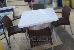 Aset of Square Table and Steel Legs Armed Chairs