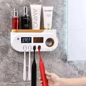 Tooth Brush and Paste Dispenser