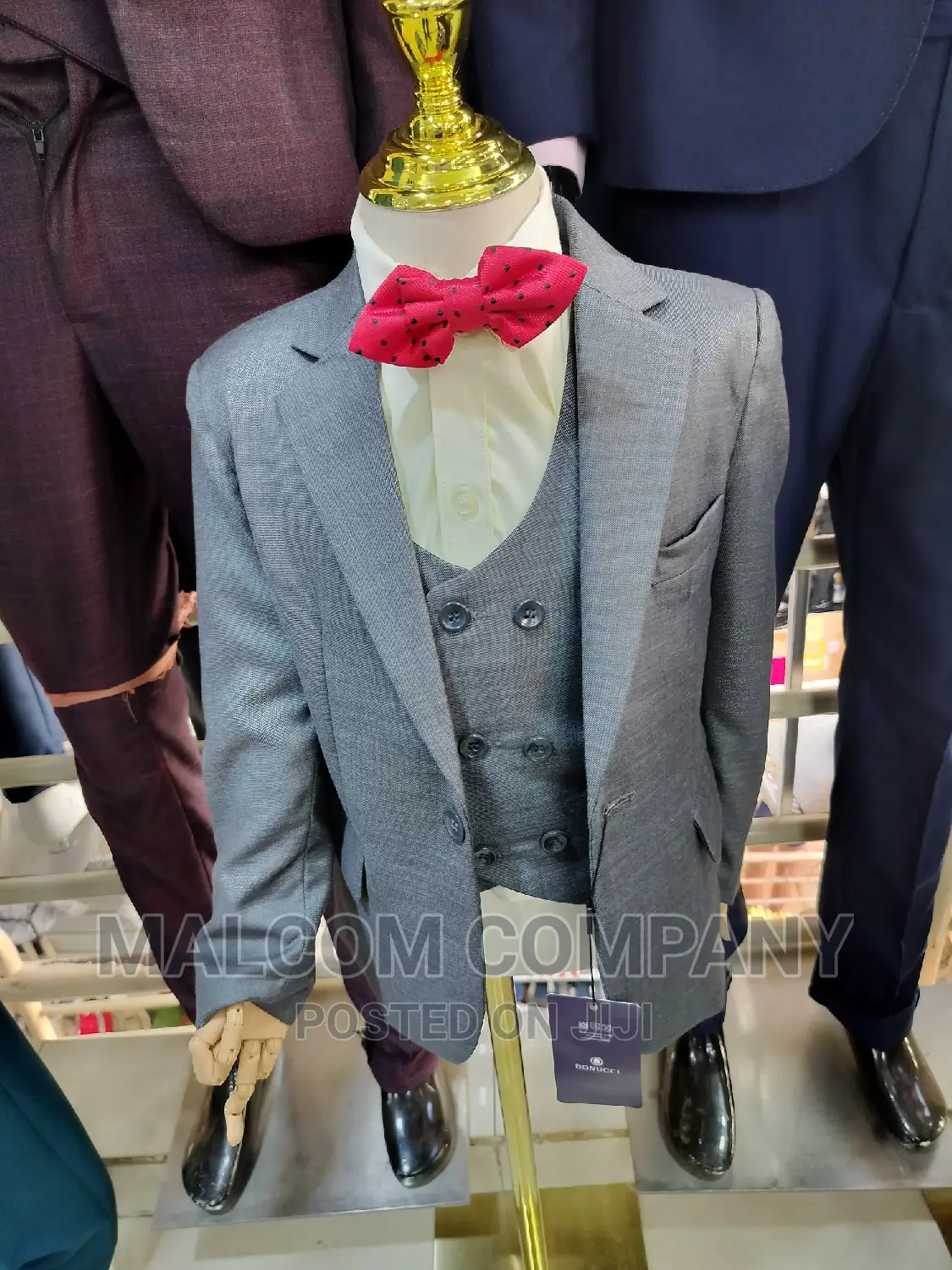 Gray Children's Suit With a Cream Shirt
