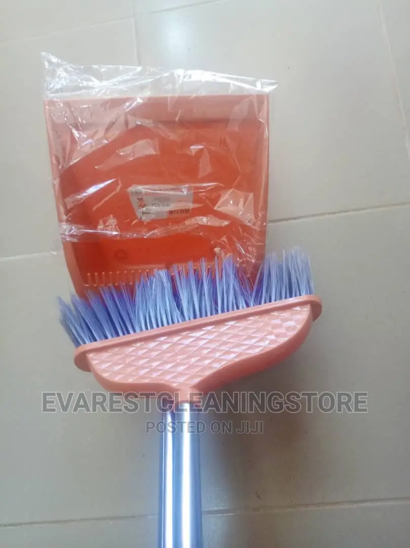 Long Dust Pan With a Broom