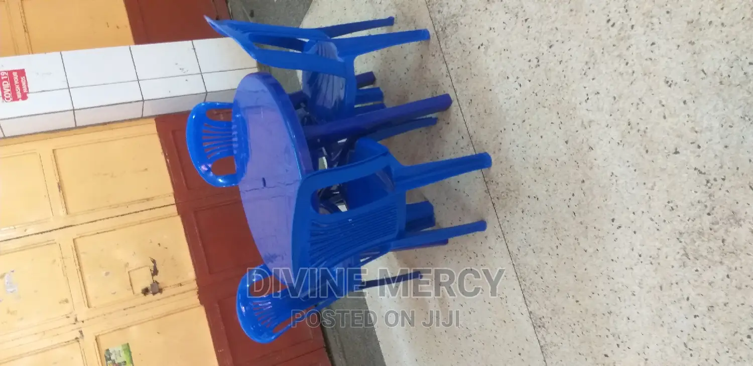 Aset of Plastic Table and Armless Chairs