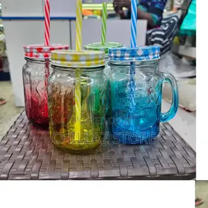 6pcs of Glass Juice Mugs With Covers.