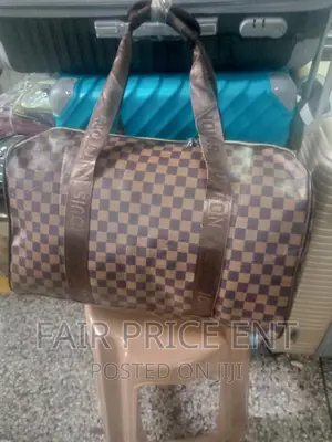 Original Leather Safari Bag by Louis Viton. Medium.( Brown)