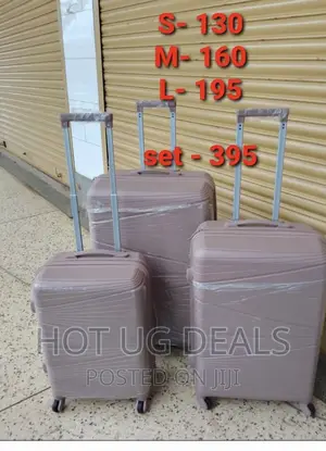 4 Wheel Rubber Plastic Waterproof Suitcase- Multicolor