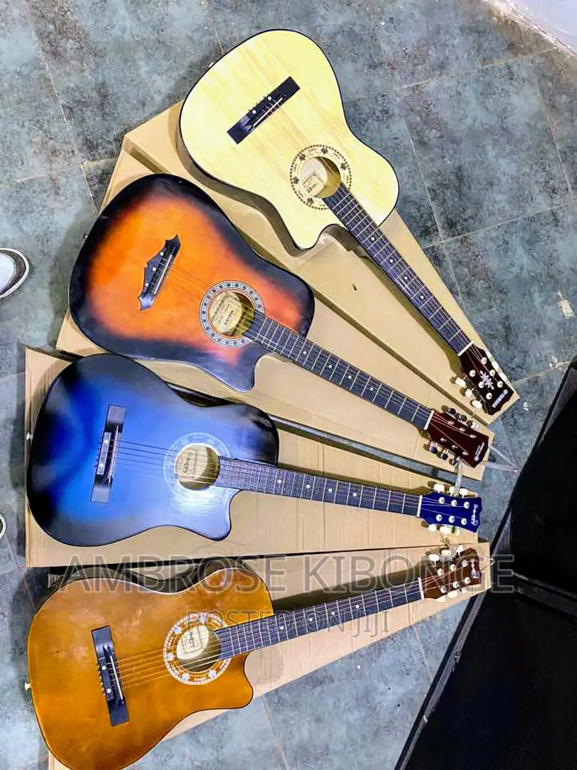 Dream Maker Multicolored Acoustic Guitar With FREE Plectrum.