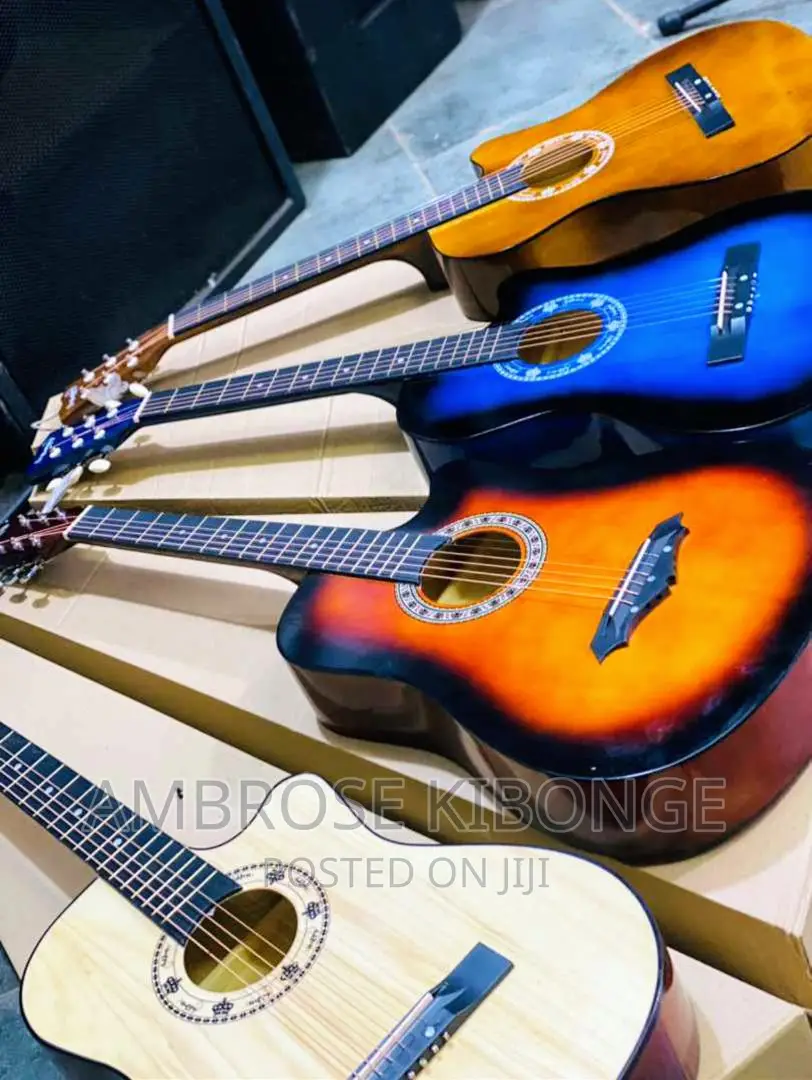 Dream Maker Multicolored Acoustic Guitar With FREE Plectrum.