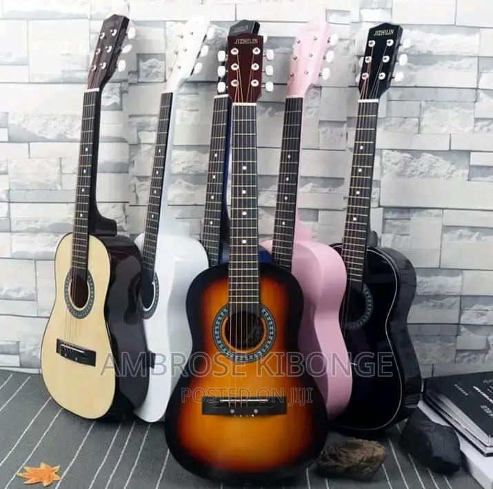 Dream Maker Multicolored Acoustic Guitar With FREE Plectrum.