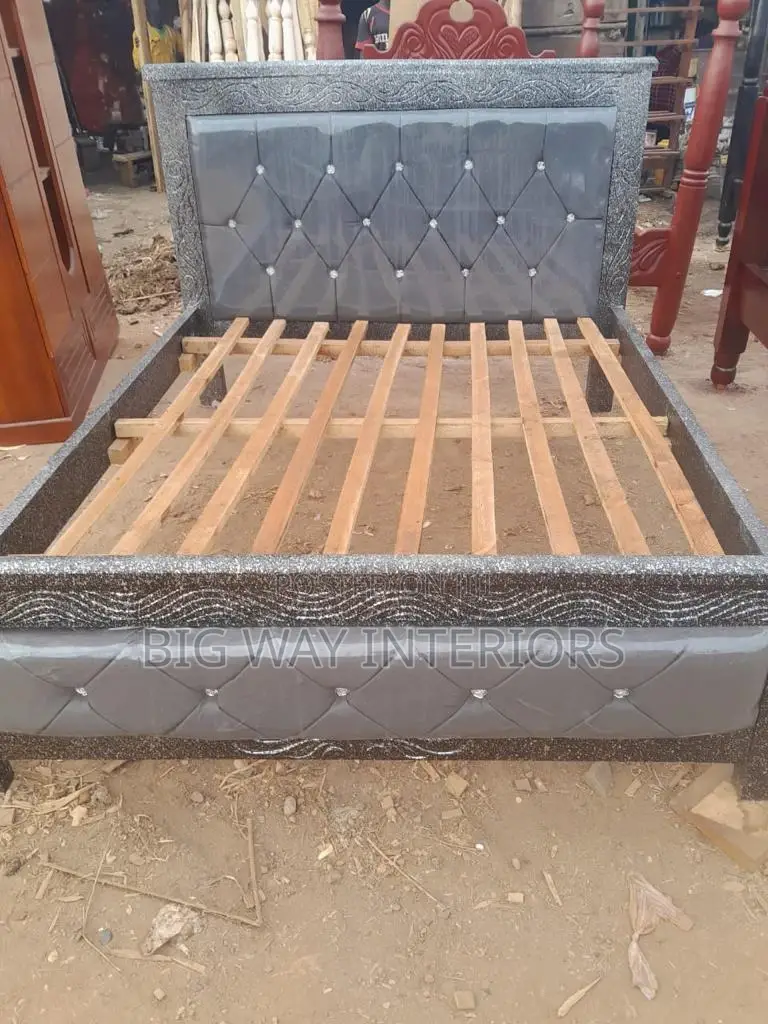 Brand New 5x6 Gray Leather Bed