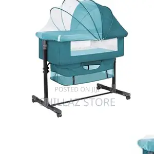 Photo - Foldable Baby Crib.