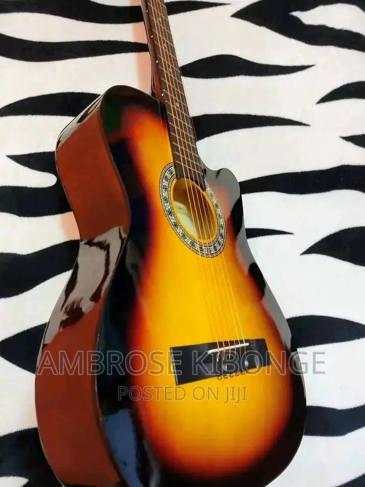 Dream Maker Multicolored Acoustic Guitar With FREE Plectrum.