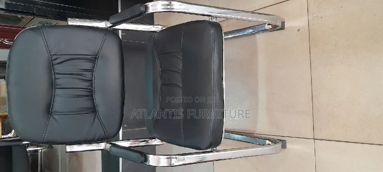 An Executive Office Chair With Stainless Steel Legs