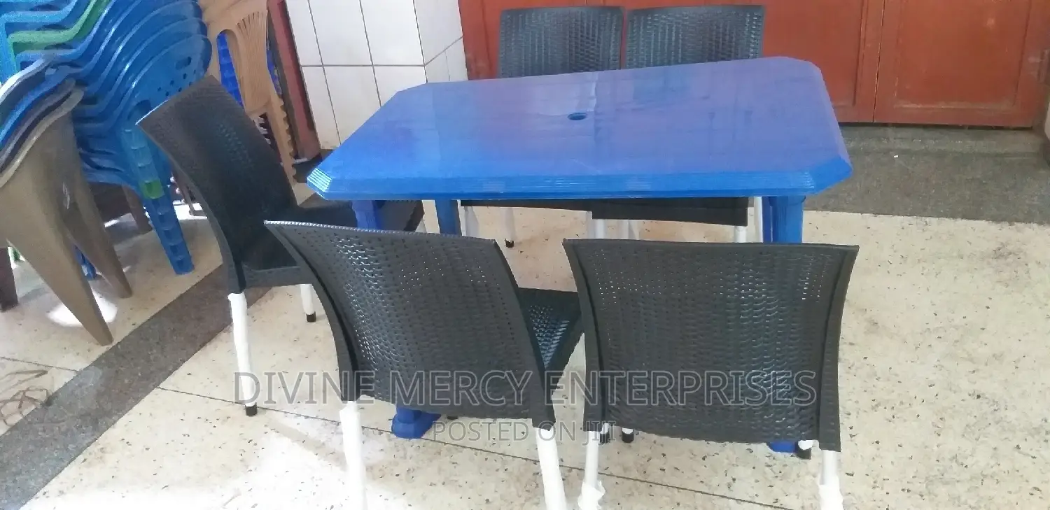 Aset of Plastic Table and Steel Leg Chair