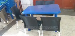 Aset of Plastic Table and Steel Leg Chair