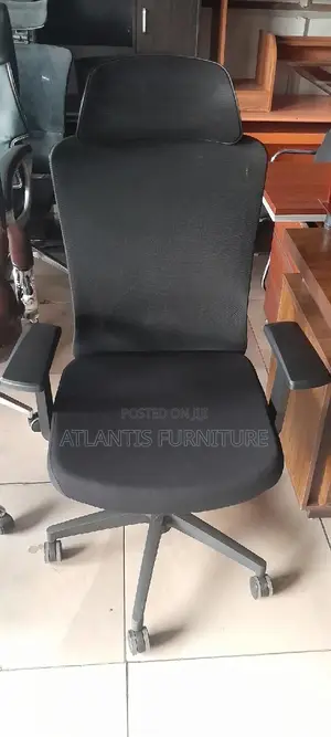 An High Back Chair With Headrest.
