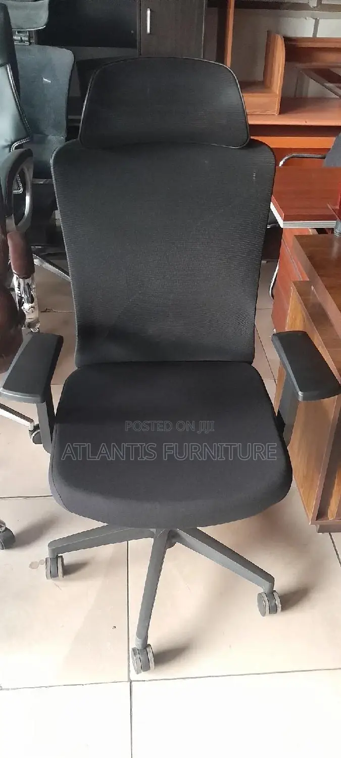 An High Back Chair With Headrest.