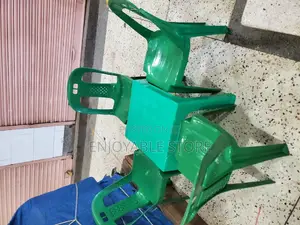 Green Plastic Chairs and Table