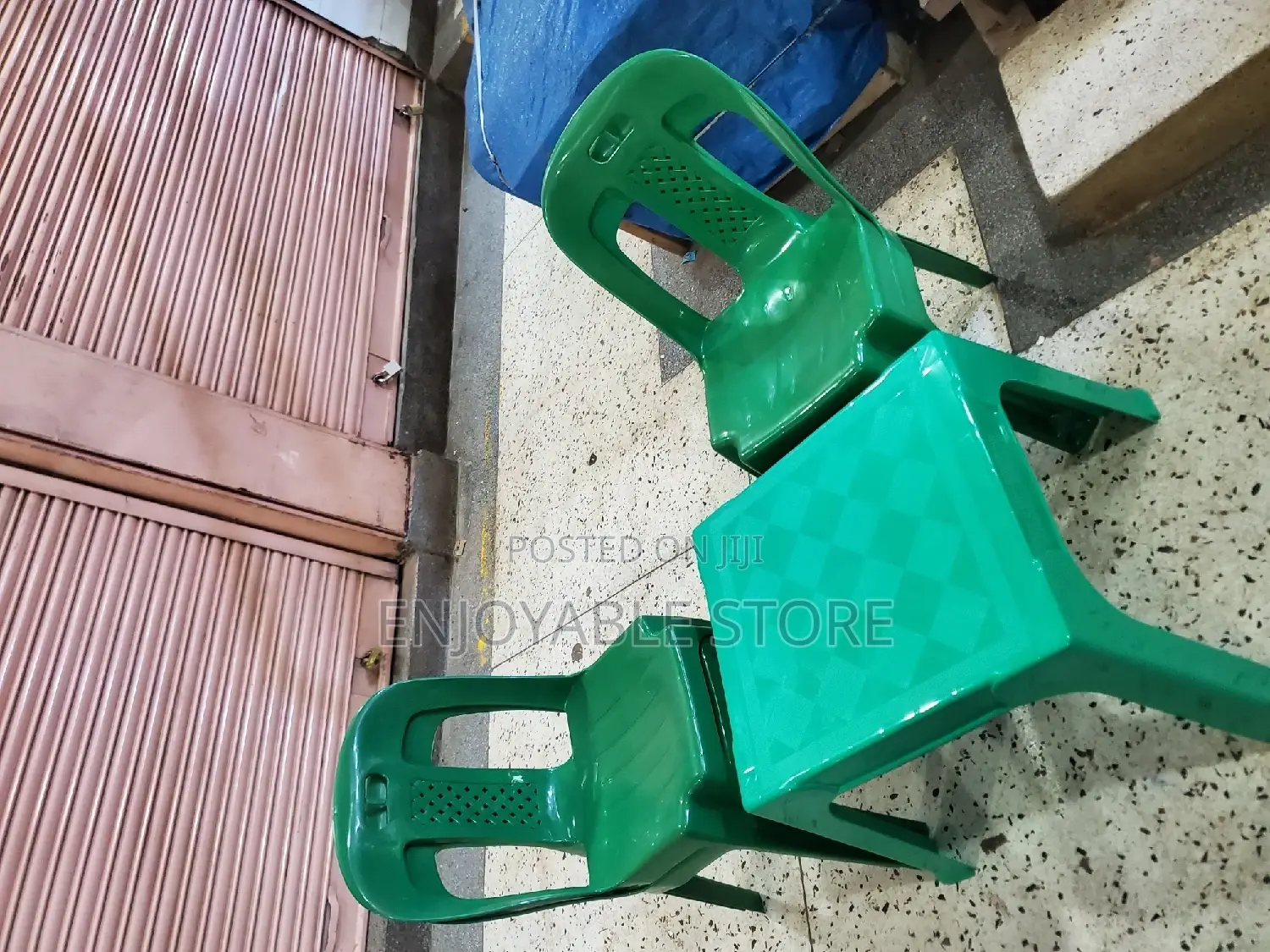 Green Plastic Chairs and Table