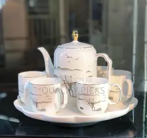 Tea Cup With Tea Pot