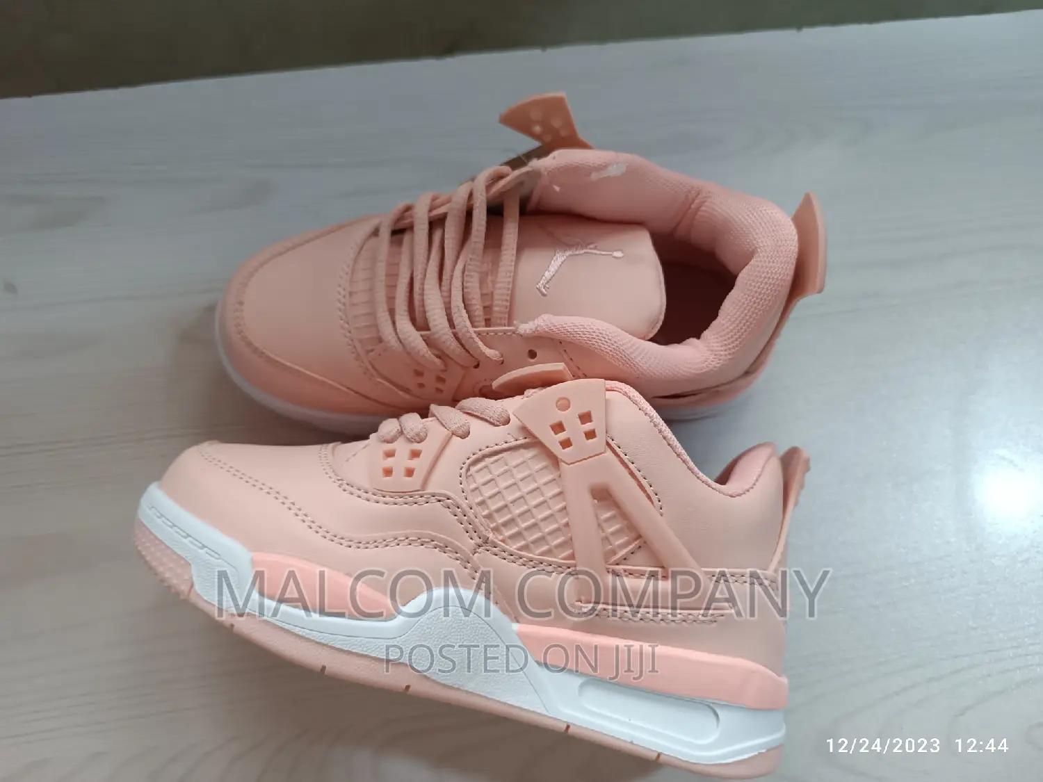 Pink Jordan 4 Girl's Sneakers