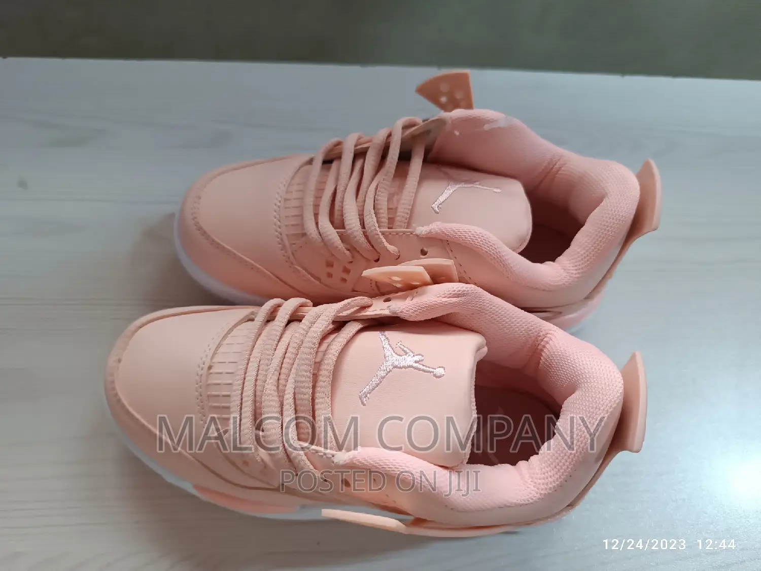 Pink Jordan 4 Girl's Sneakers